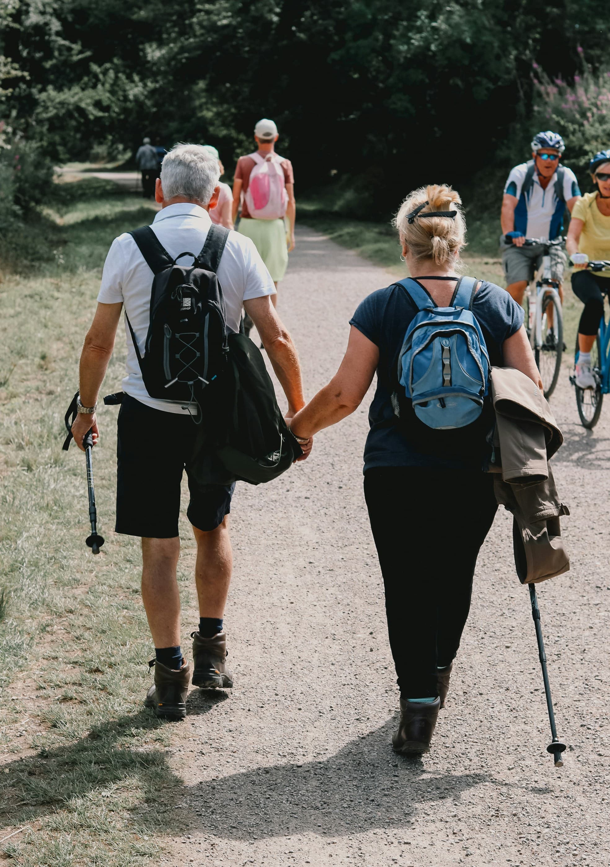 An older adult exercising outdoors